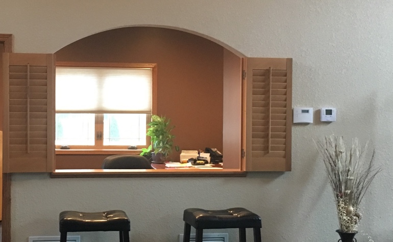 Shutters framing out a room's passthrough